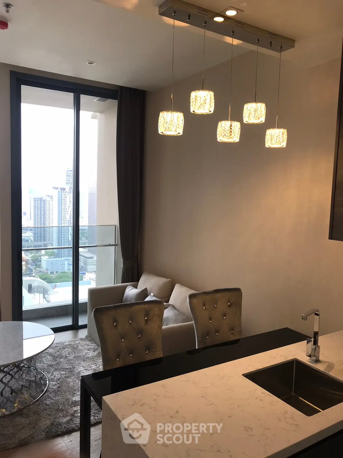 Modern living room with city view and elegant lighting