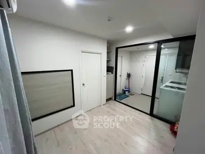 Modern apartment interior with sleek kitchen and spacious layout