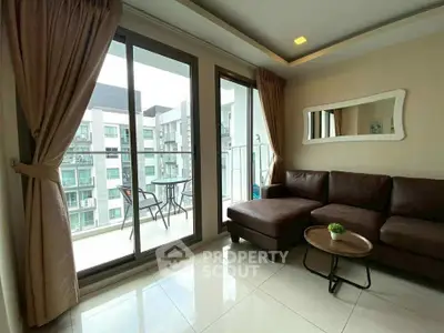 Modern living room with balcony view in contemporary apartment
