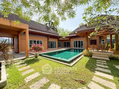 Luxurious villa with private pool and lush garden, perfect for serene living.