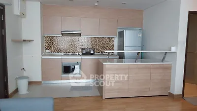 Modern kitchen with sleek cabinetry and stainless steel appliances