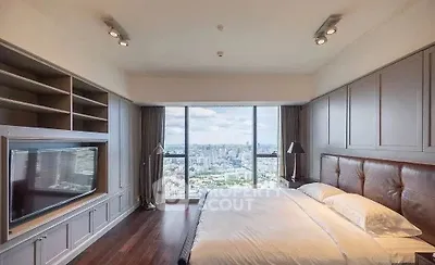 Luxurious bedroom with panoramic city view and elegant decor