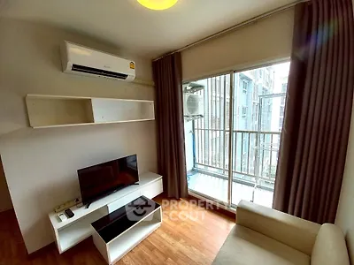 Modern living room with balcony view and sleek furniture
