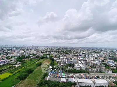Stunning panoramic cityscape view showcasing urban skyline and lush greenery, perfect for real estate investment.