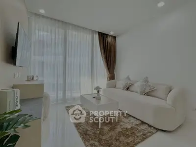 Modern living room with elegant decor and natural light