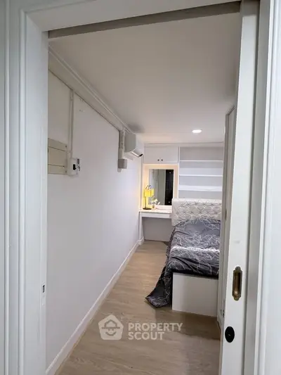 Cozy bedroom with modern design and built-in storage solutions