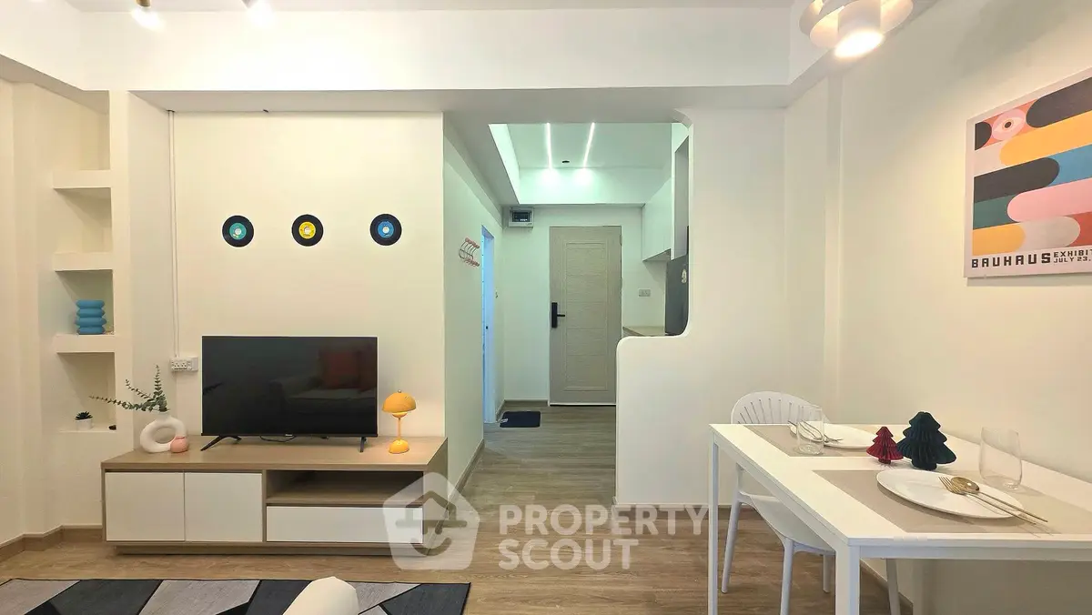 Modern living room with stylish decor and dining area