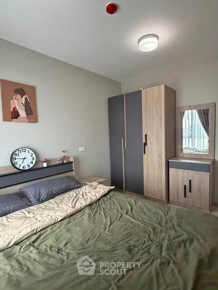 Cozy bedroom with modern wardrobe and stylish decor