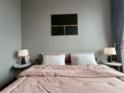 Elegant bedroom with modern decor and cozy bedding