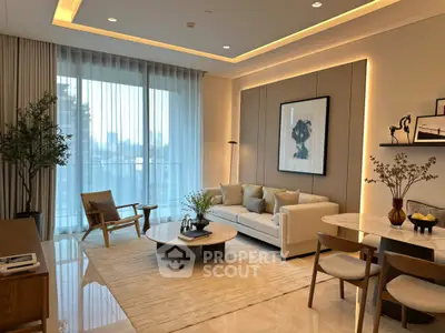 Elegant modern living room with stylish decor and large windows offering natural light