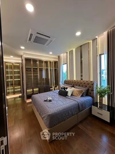 Luxurious bedroom with elegant decor and spacious walk-in closet