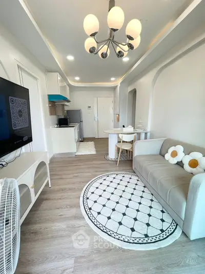 Modern living room with stylish decor and open kitchen layout