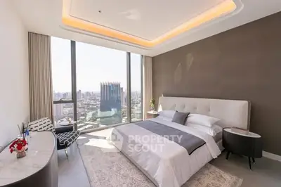 Luxurious bedroom with stunning city view and modern decor