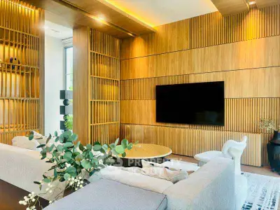 Luxurious modern living room with elegant wood paneling and stylish furniture