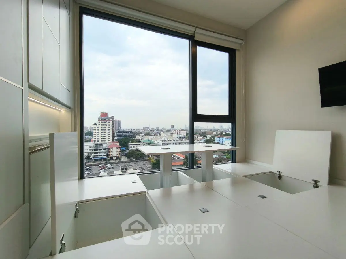 Modern apartment with innovative storage solutions and panoramic city view.