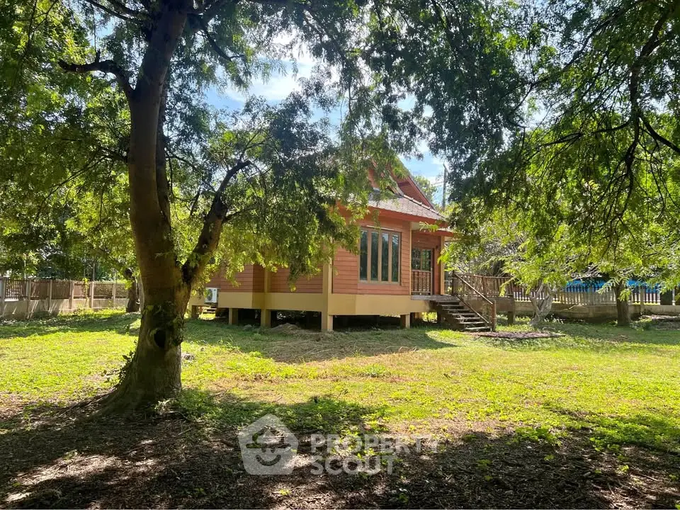 Charming wooden house surrounded by lush greenery, perfect for nature lovers seeking tranquility.