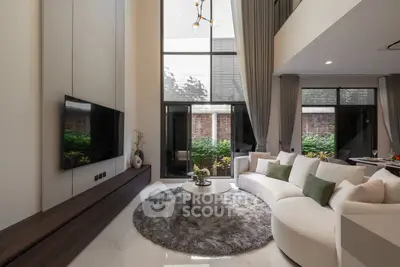 Luxurious modern living room with high ceilings and elegant decor