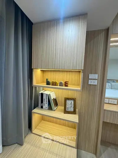 Modern bedroom with stylish wooden shelving and cozy decor accents