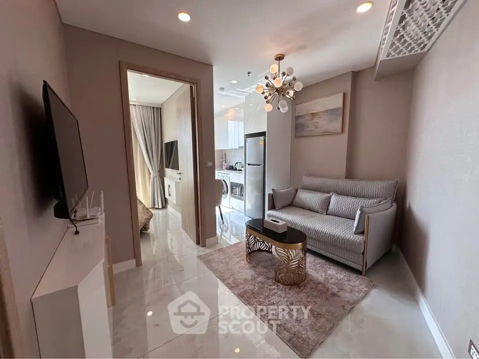 Modern living room with elegant decor and open kitchen layout