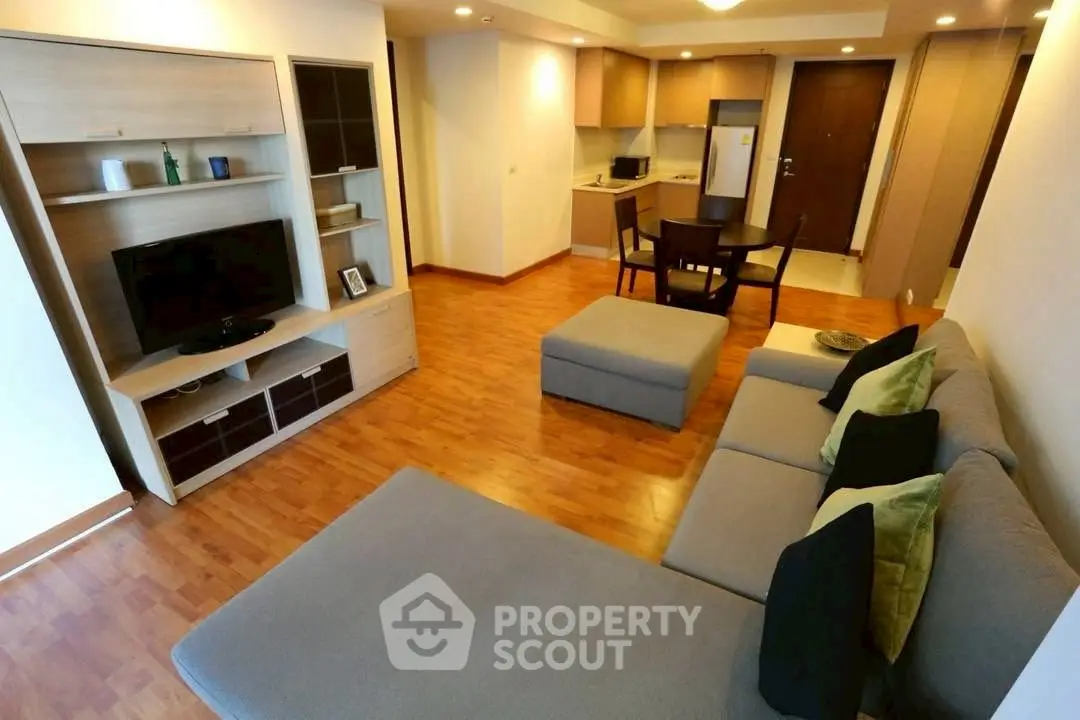 Spacious modern living room with open kitchen and stylish furniture