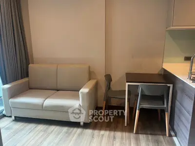 Cozy living room with modern sofa and dining table in a stylish apartment
