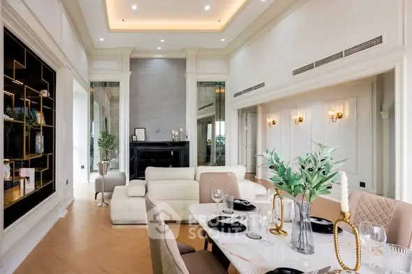 Luxurious living room with elegant dining area and modern decor