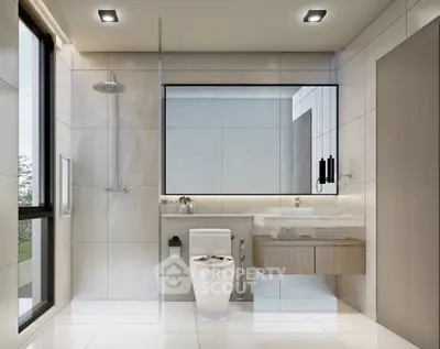 Luxurious modern bathroom with sleek fixtures and large mirror