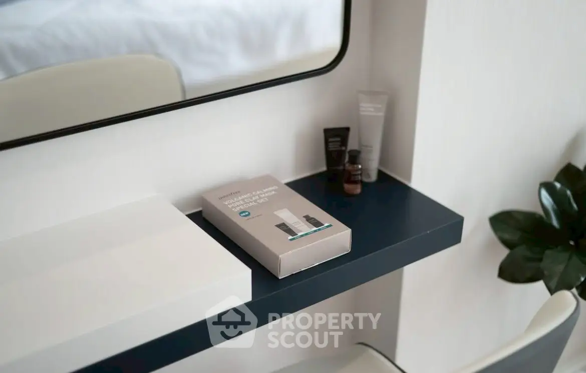 Modern minimalist interior with sleek shelf and decorative elements