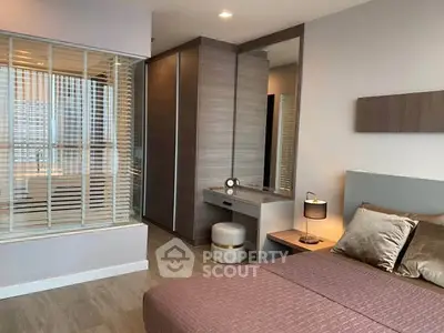 Modern bedroom with stylish decor and built-in wardrobe