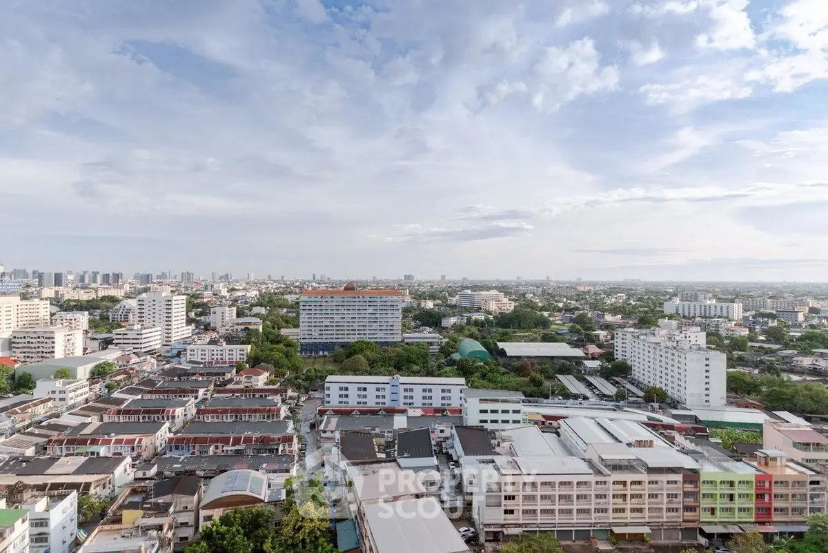 Stunning cityscape view from high-rise building showcasing urban skyline and expansive horizon.