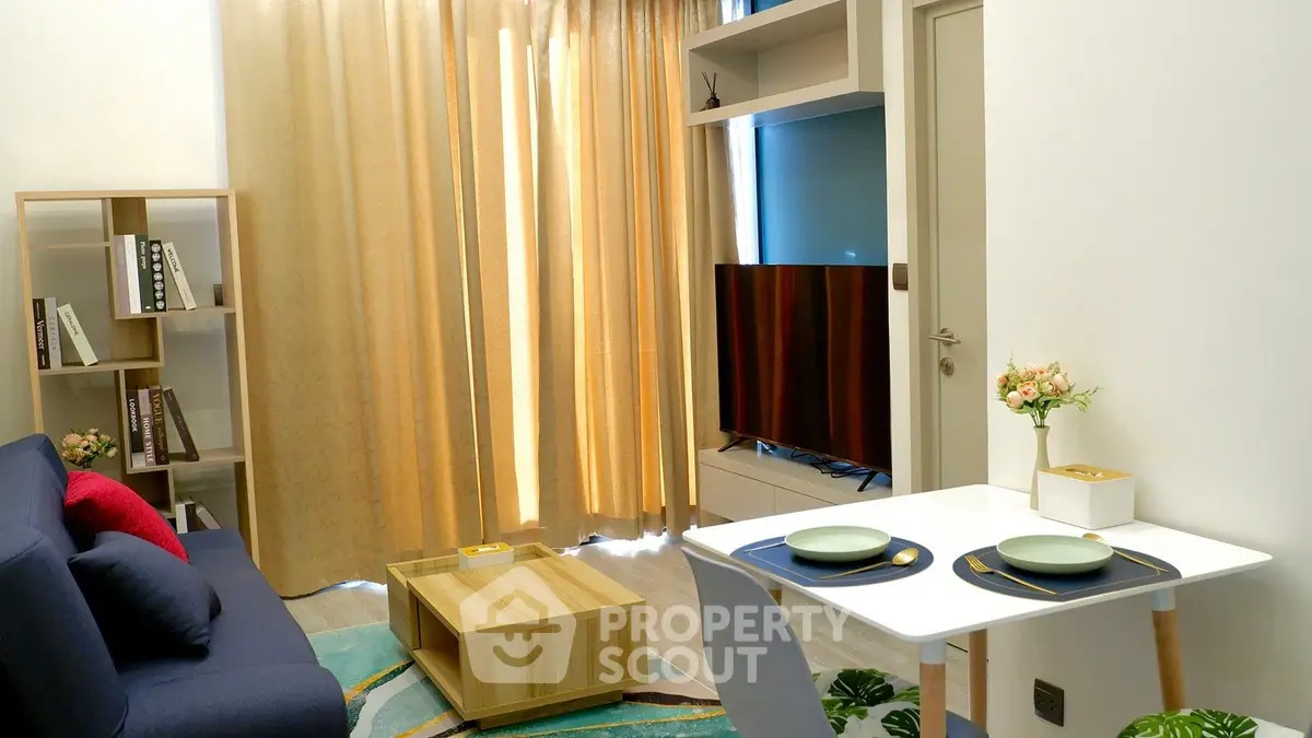 Modern living room with stylish decor and cozy dining area