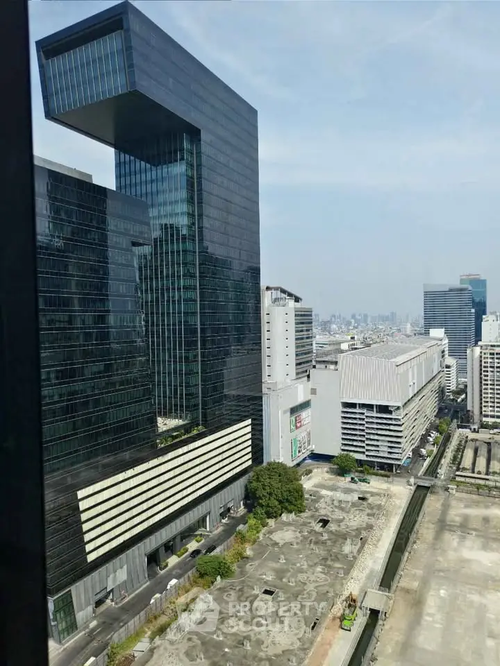 Stunning modern skyscraper with unique architecture and panoramic city views.