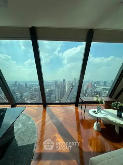 Stunning high-rise apartment with panoramic city views and elegant interior design.