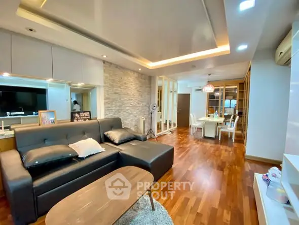 Spacious modern living room with open layout and elegant dining area