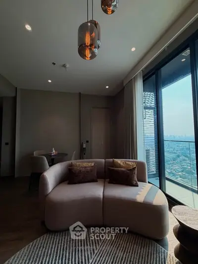 Modern living room with stylish sofa and city view from large windows