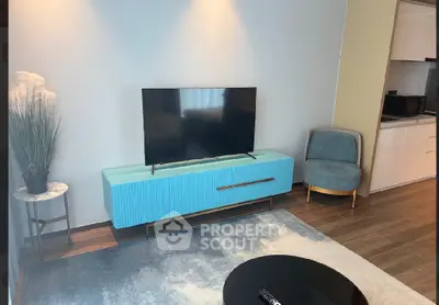 Modern living room with stylish TV stand and cozy seating area