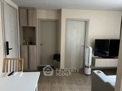 Spacious modern living room with sleek furniture, ample storage, and contemporary design, perfect for urban living.