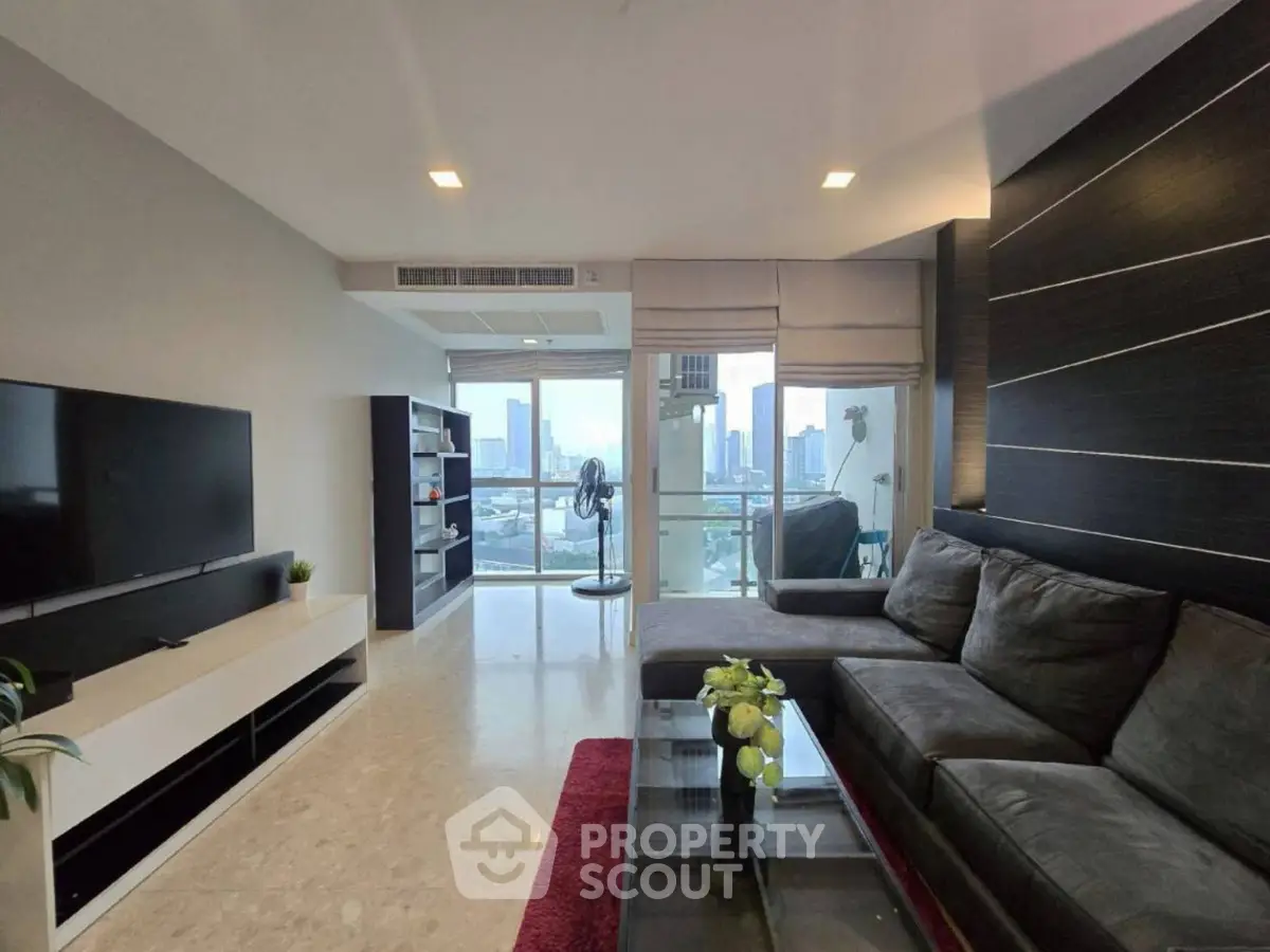 Spacious modern living room with city view and stylish decor