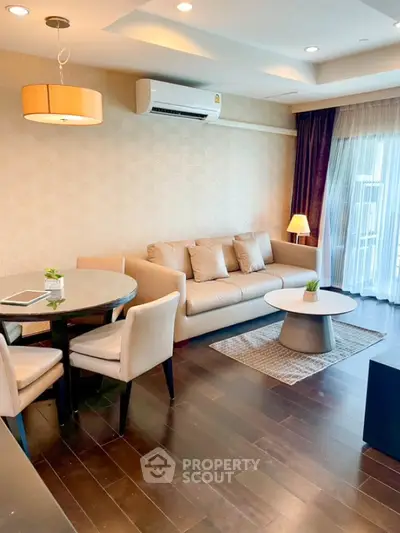 Elegant living room with modern furniture and natural light