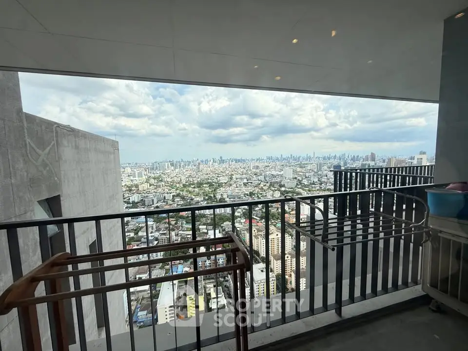 Stunning cityscape view from a high-rise balcony, perfect for urban living enthusiasts.