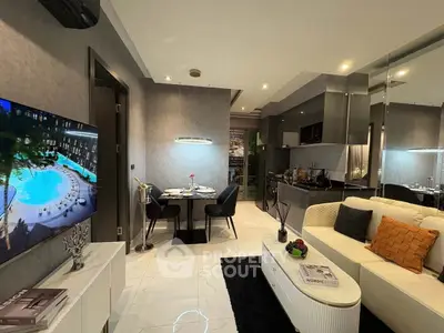 Modern living room with open kitchen and stylish decor