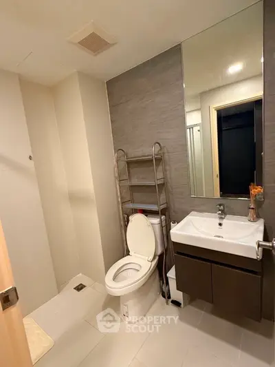 Modern bathroom with sleek fixtures and neutral tones