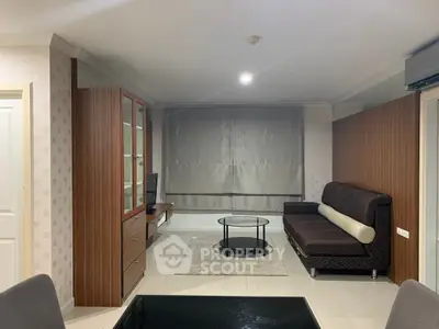 Modern living room with sleek furniture and stylish decor, perfect for comfortable living.
