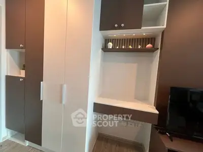 Modern living room with built-in storage and TV setup