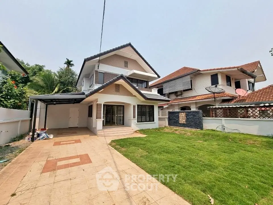 Charming suburban house with spacious front yard and modern design.