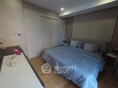 Modern bedroom with stylish decor and cozy ambiance