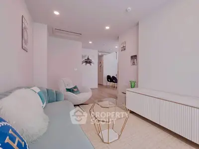 Modern living room with stylish furniture and elegant decor, perfect for relaxation and entertaining.