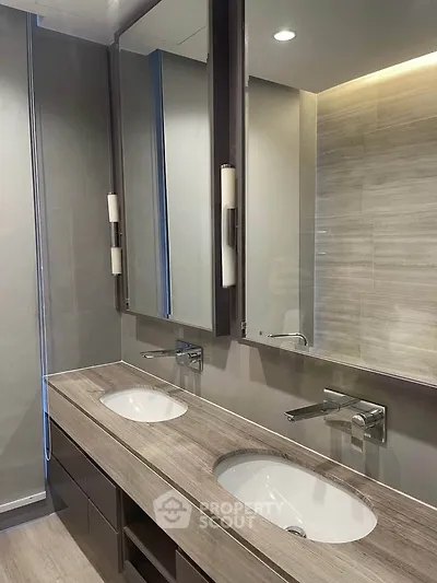 Modern bathroom with dual sinks and sleek design