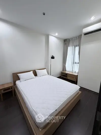 Modern bedroom with minimalist design and natural light