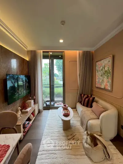 Stylish living room with modern decor and balcony view, perfect for relaxation and entertainment.